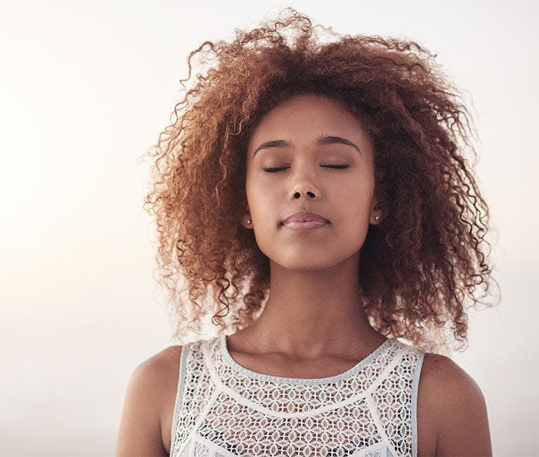 Woman relieved breathes in air