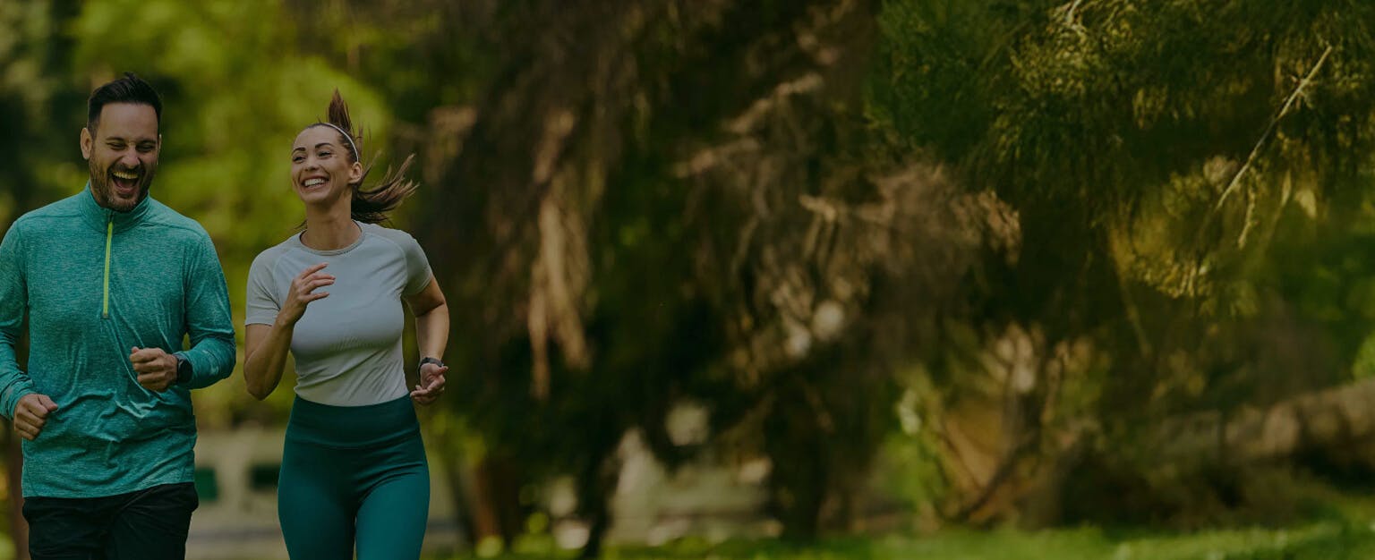 Couple running outside