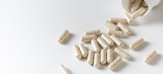 Fiber supplement pills on counter