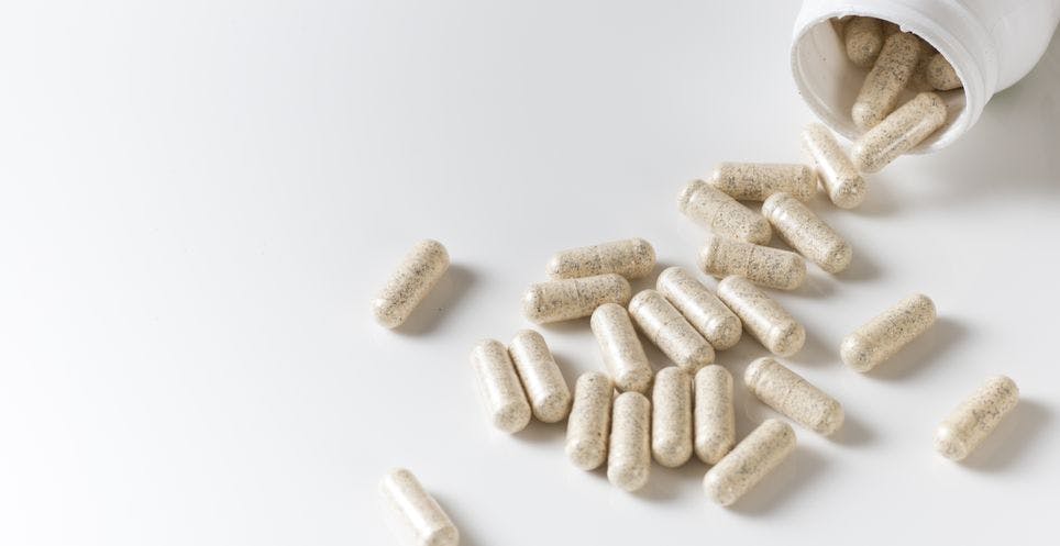 Fiber supplement pills on counter
