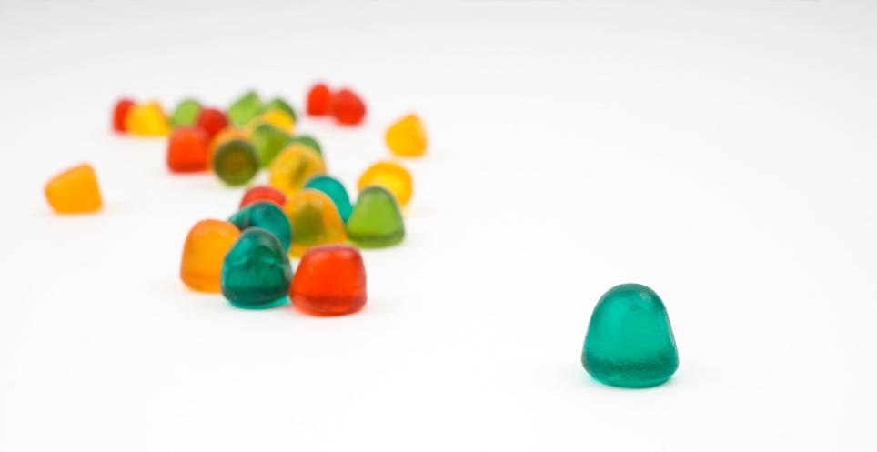 A close up of a group of flavored gummies A close up of a group of flavored gummies