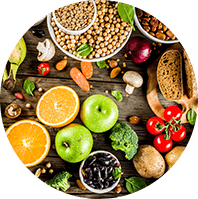 Pile of high fiber foods like fruits, nuts and vegetables