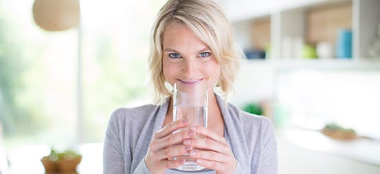 Woman Drinking Fiber Supplement Woman Drinking Fiber Supplement