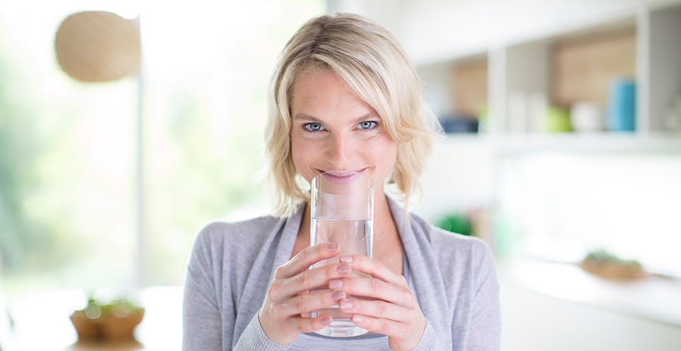 Woman Drinking Fiber Supplement Woman Drinking Fiber Supplement