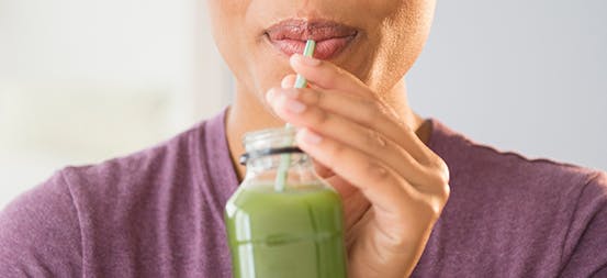 Woman Drinking Smoothie Woman Drinking Smoothie