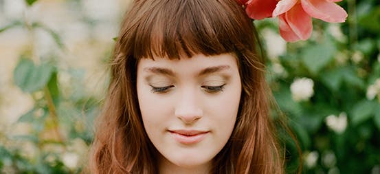 Woman with Flowers in Hair