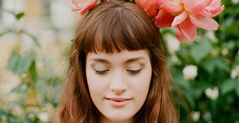 Woman with Flowers in Hair