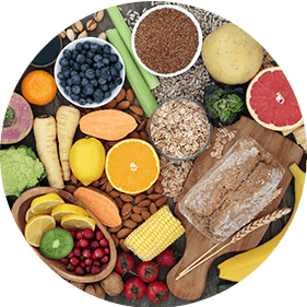 High fiber foods including beans, nuts, whole grains and some fruits and vegetables.