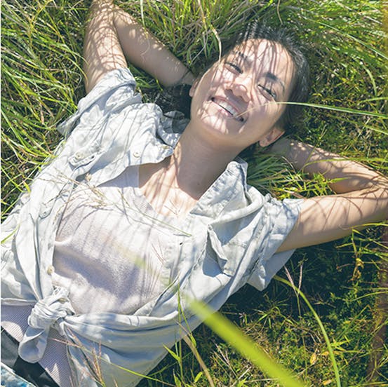 Woman Laying in Grass Woman Laying in Grass