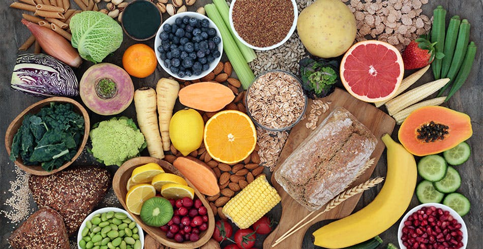 High fiber foods including beans, nuts, whole grains and some fruits and vegetables.