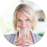 Woman Drinking Fiber Supplement
