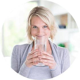 Woman Drinking Fiber Supplement
