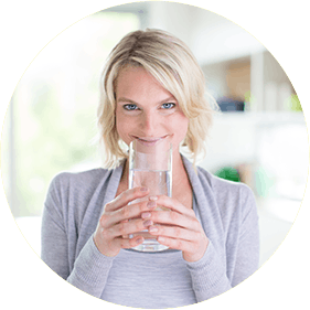 Woman Drinking Fiber Supplement