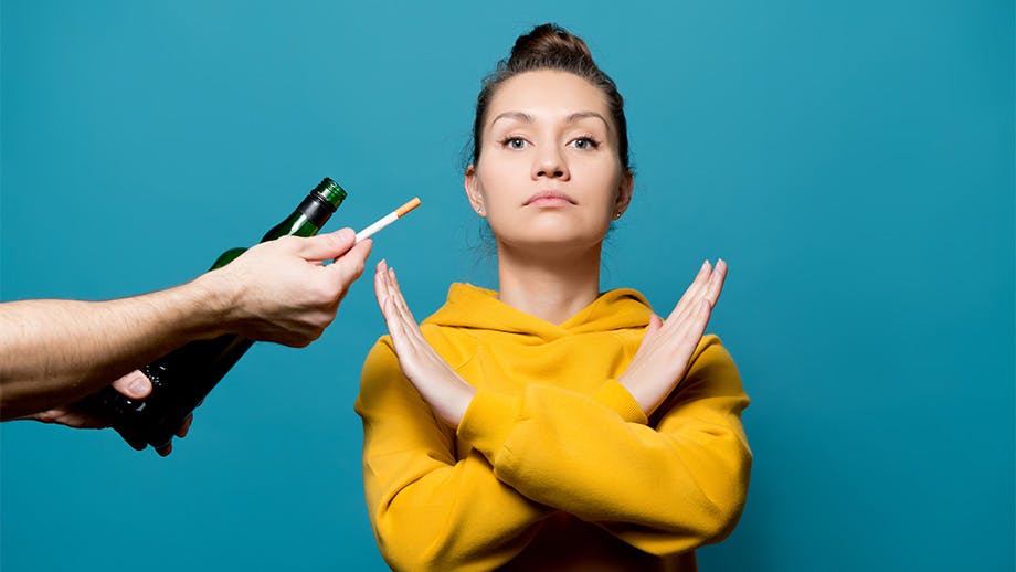 Woman refusing to drink or smoke