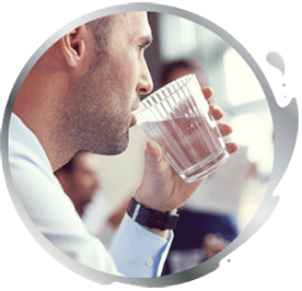 Man drinking a glass of water