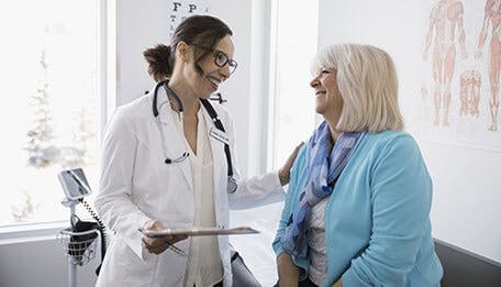 Doctor and patient discussing dry mouth causes