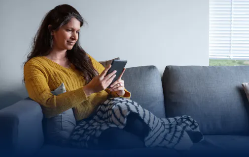 Woman reading on the couch 