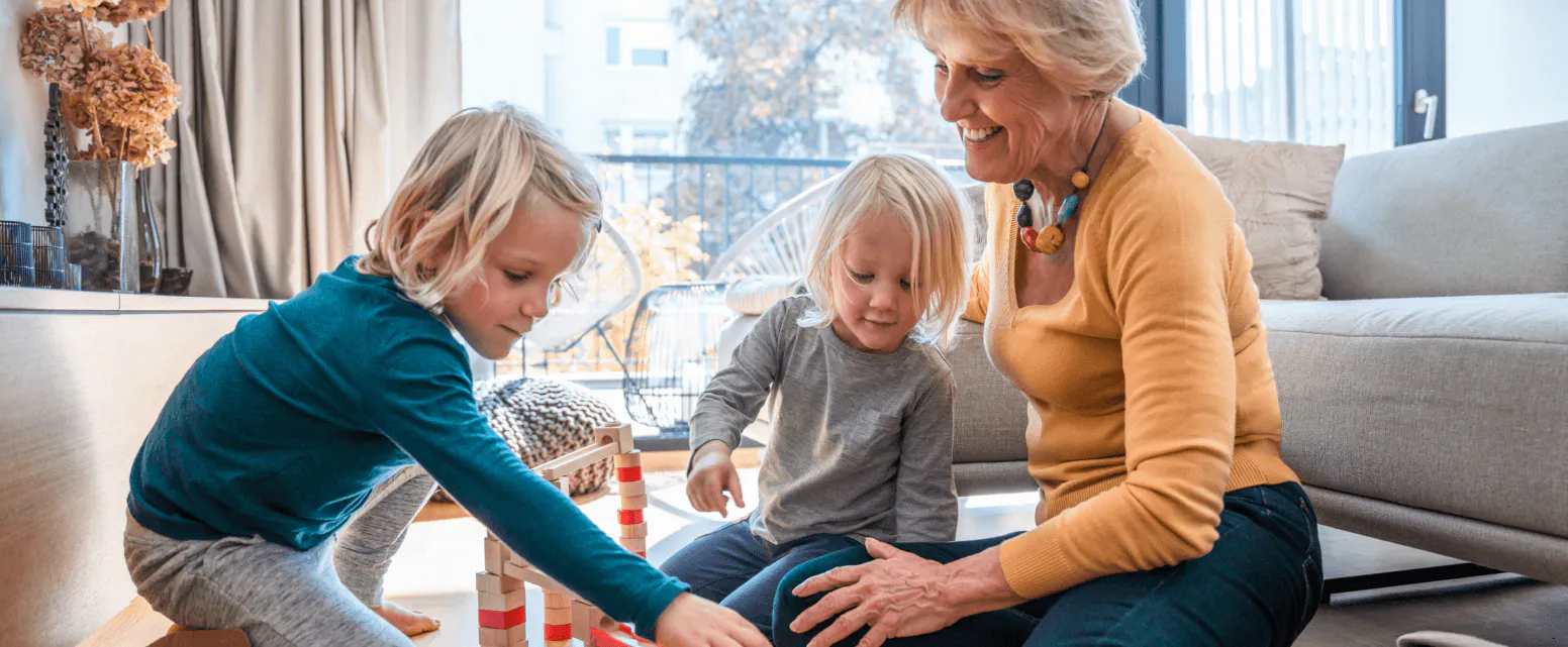 Grandmother playing with grandchildren