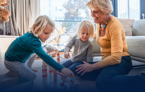 Grandmother playing with grandchildren 