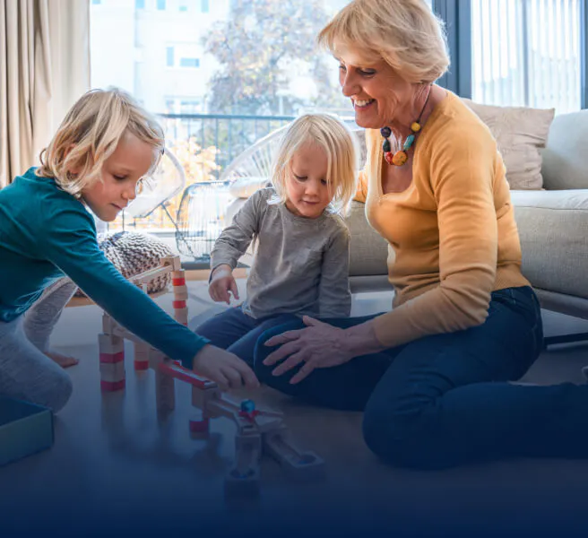 Grandmother playing with grandchildren 