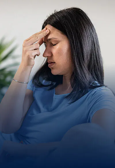 Woman holding her head 