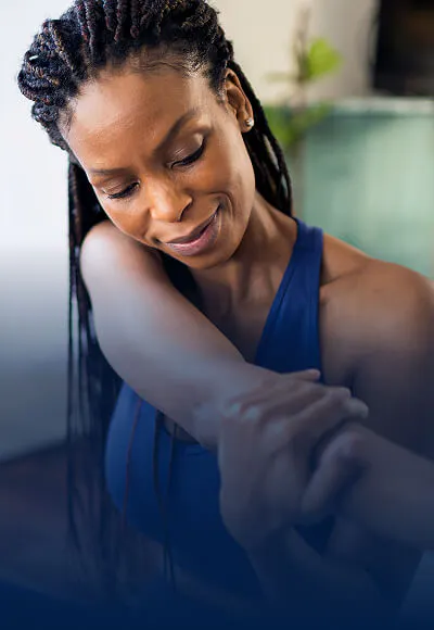 Woman stretching her arm 