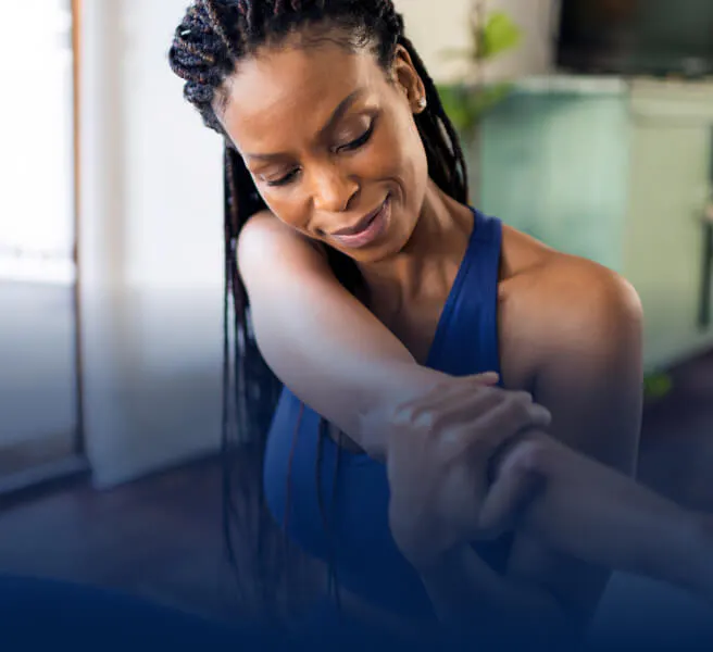 Woman stretching her arm 