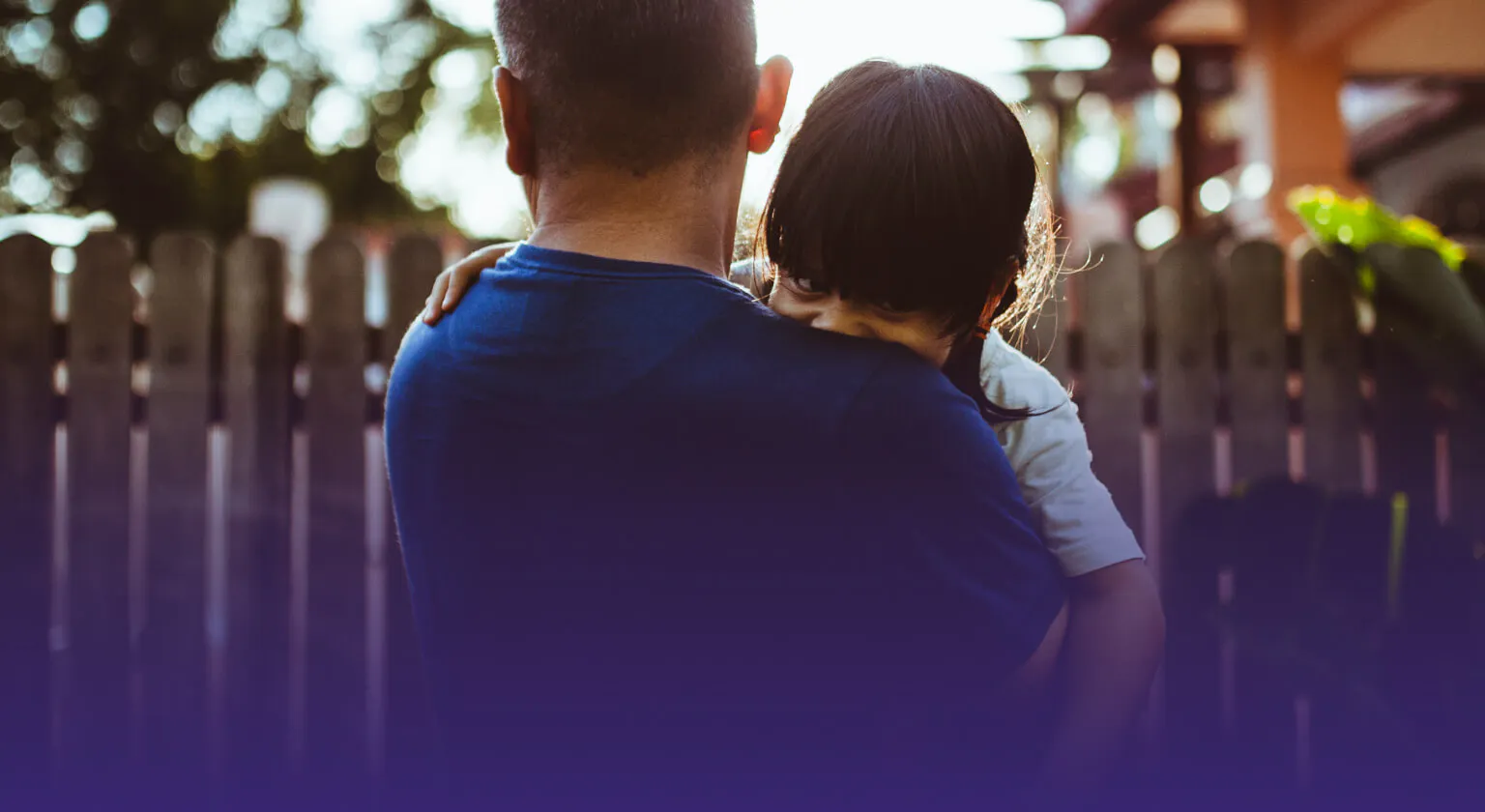 Father holding his child