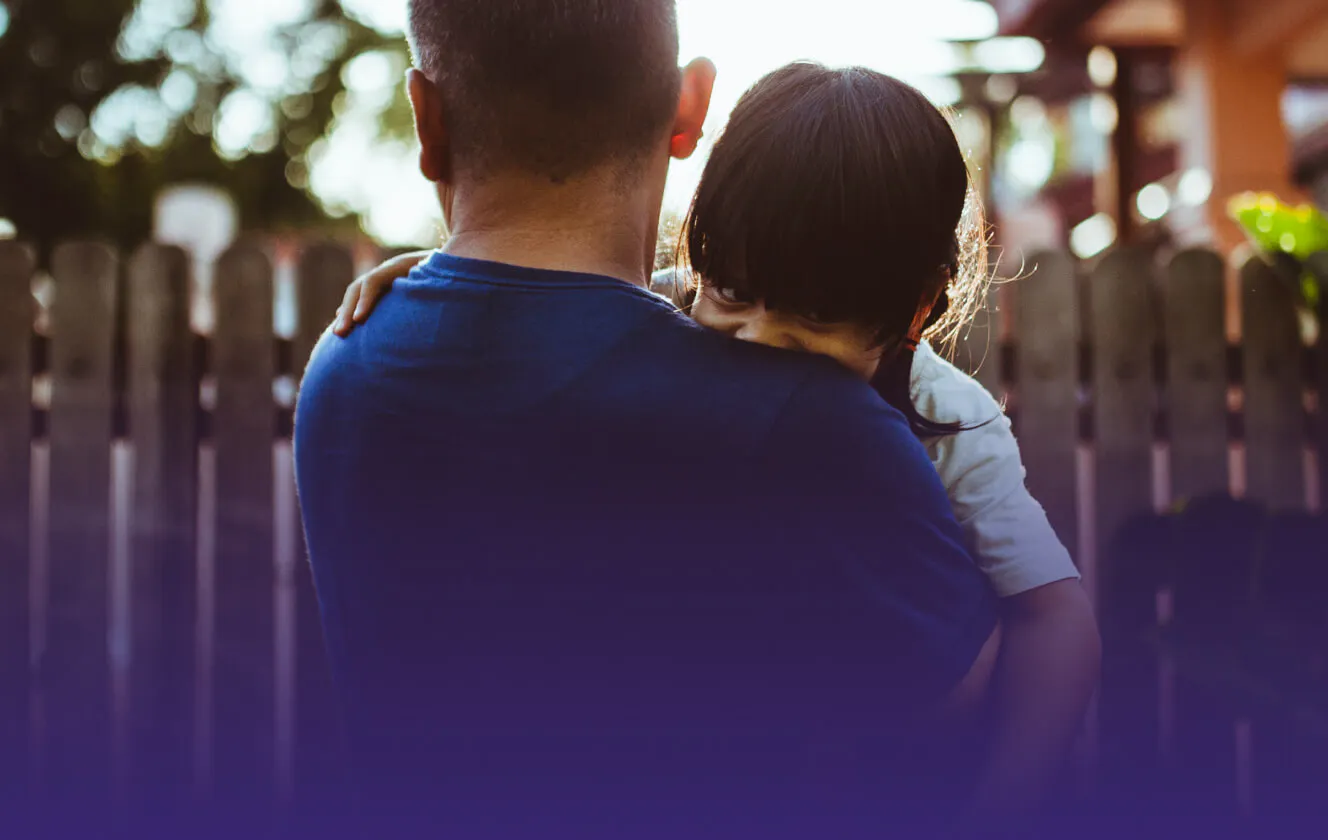 Father holding his child