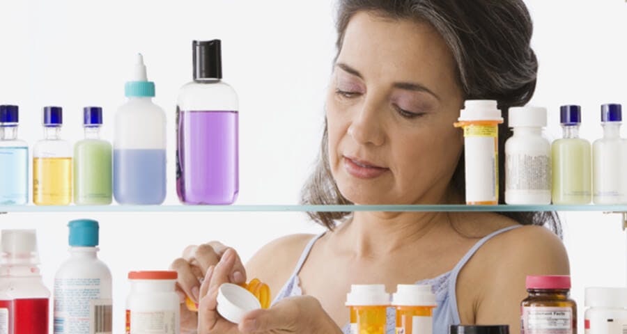women checking medicines