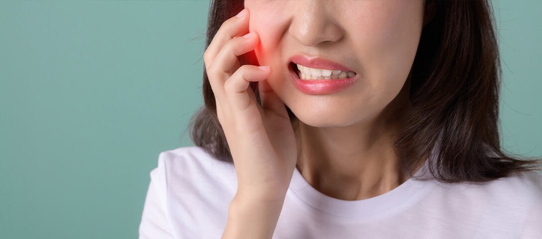 Woman with tooth pain needs a NSAID for tooth pain relief
