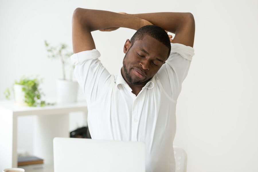 5 Stretches to Do at Your Desk | Advil