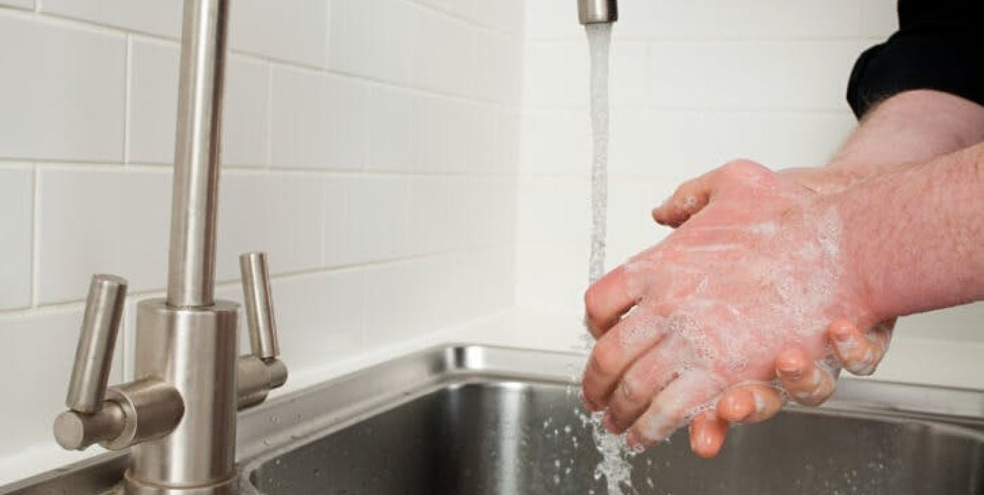 Person washing hands