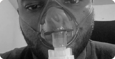 Photo of Mark wearing oxygen mask
