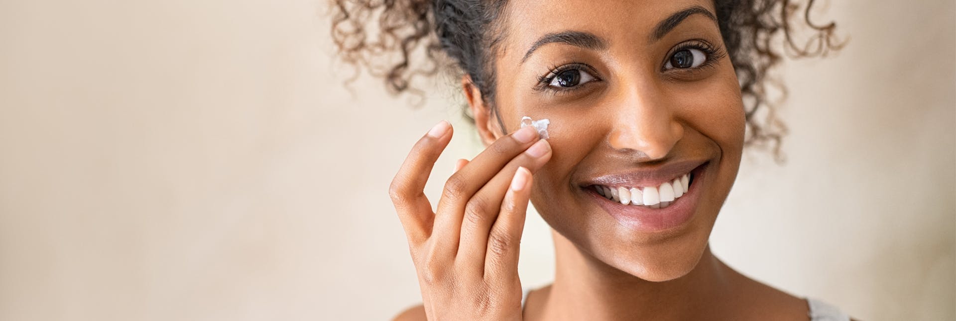 1593933484 Woman putting on skin care