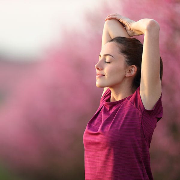 Woman running on a mountain