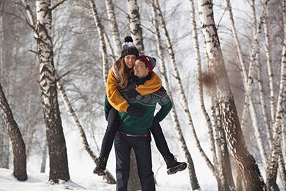 Couple walking in the forest