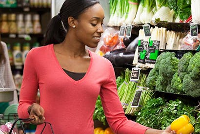 Young woman doing grocery shopping.