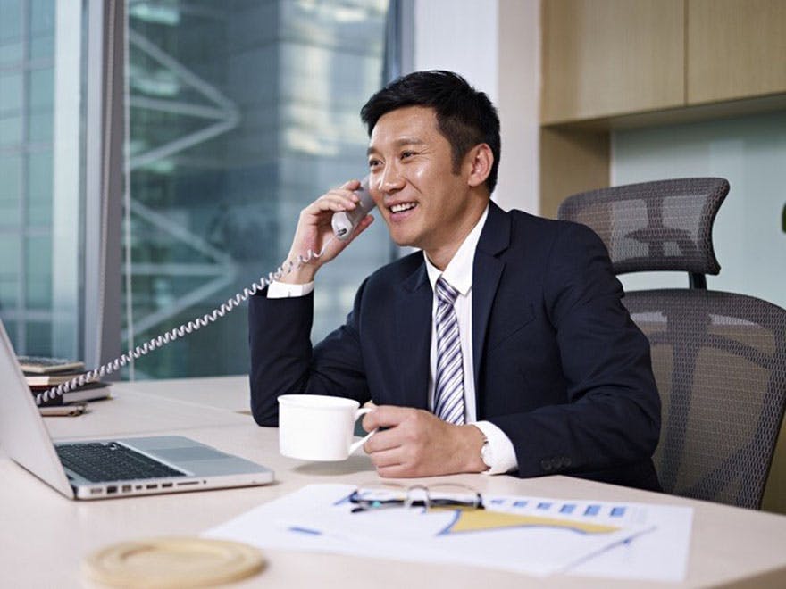 Man_calling_in_office Man_calling_in_office