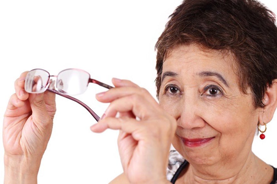 Old-lady-looking-at-her-spectacle Old-lady-looking-at-her-spectacle