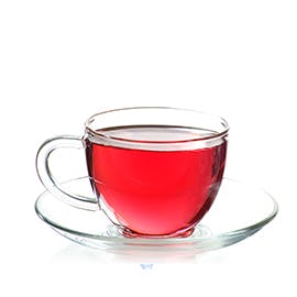 Hot Tea Pink Edition drink in clear teacup 