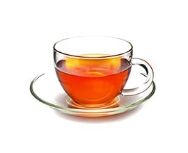 Orange Spice Tea in a clear teacup