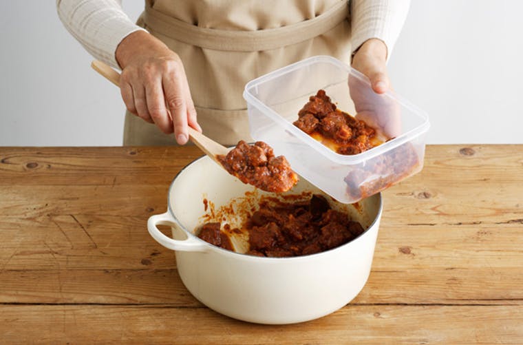 Turn an empty, well-washed milk jug into a reuseable sandwich container.