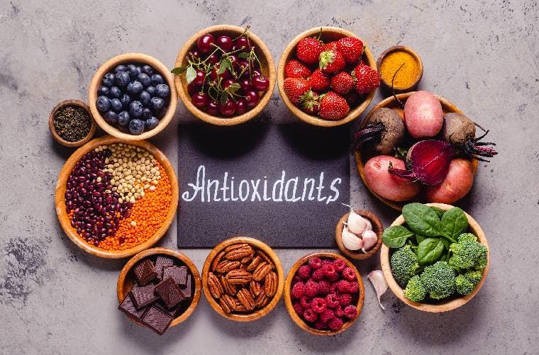 Healthy foods with antioxidants in bowls
