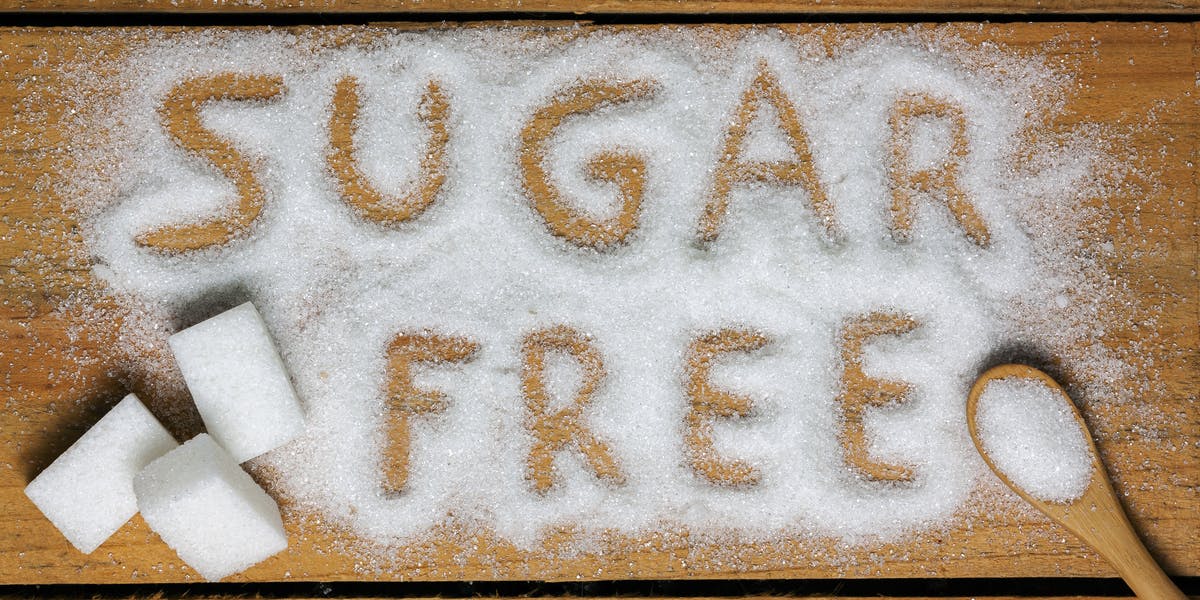 The words “Sugar Free” written in a pile of white granulated sugar