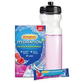Box and packet of Emergen-C Hydration resting beside a full water bottle
