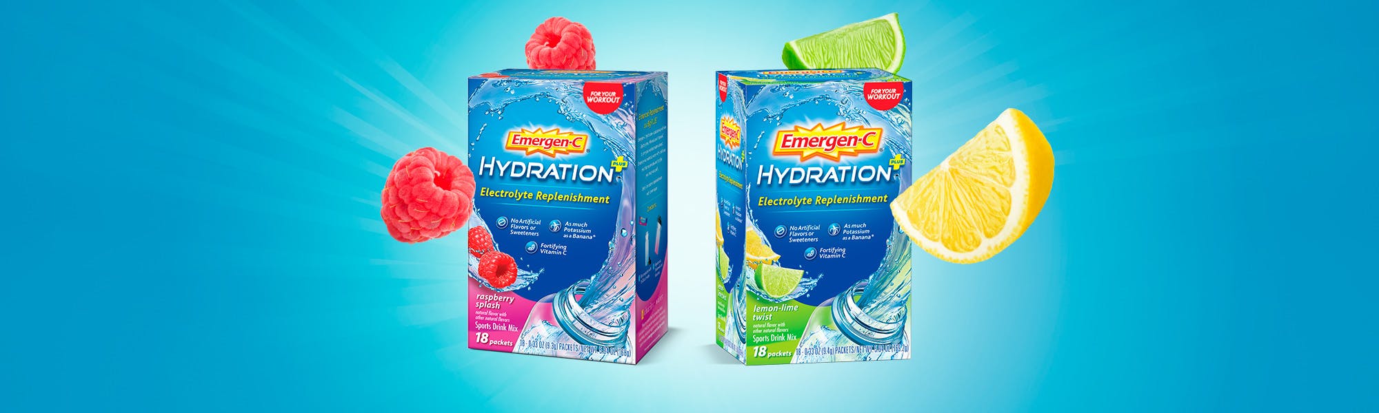 Boxes of Emergen-C Hydration Plus Electrolyte Replenishment in Raspberry Splash and Lemon-Lime Twist with fresh fruit