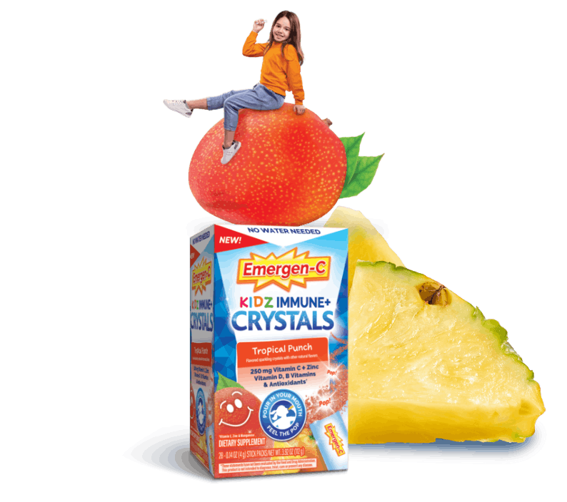 Emergen-C Kidz Sparkly Strawberry Crystals product with child sitting on top of strawberry