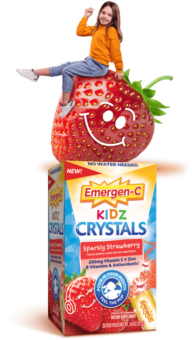 Emergen-C Kidz Sparkly Strawberry Crystals product with child sitting on top of strawberry