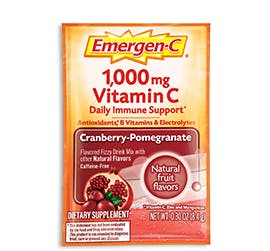 Box of Emergen-C Everyday Immune Support in Cranberry Pomegranate flavor with packet and water glass Box of Emergen-C Everyday Immune Support in Cranberry Pomegranate flavor with packet and water glass